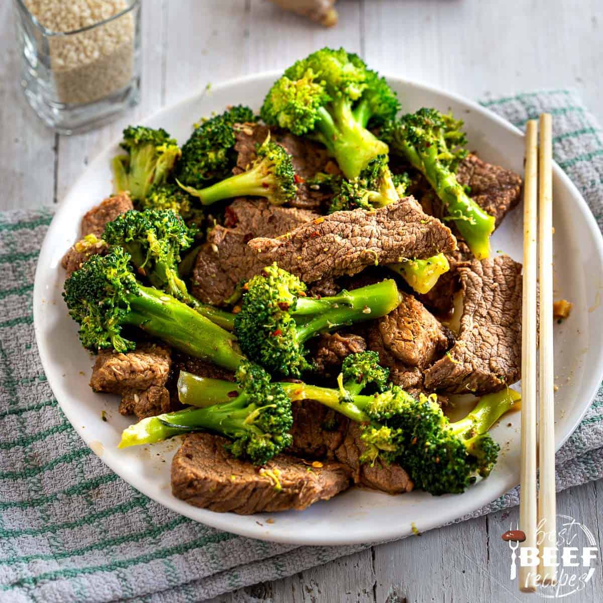 Close up of low carb beef and broccoli with chopsticks