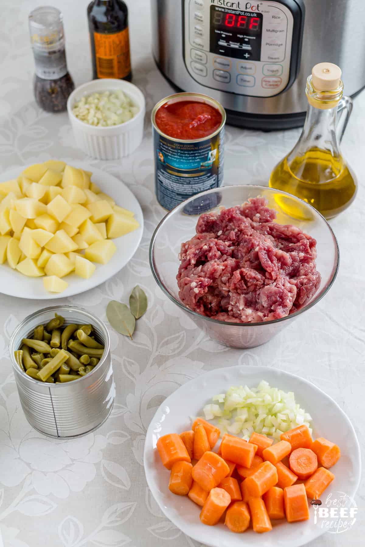 Ingredients for hamburger soup on table