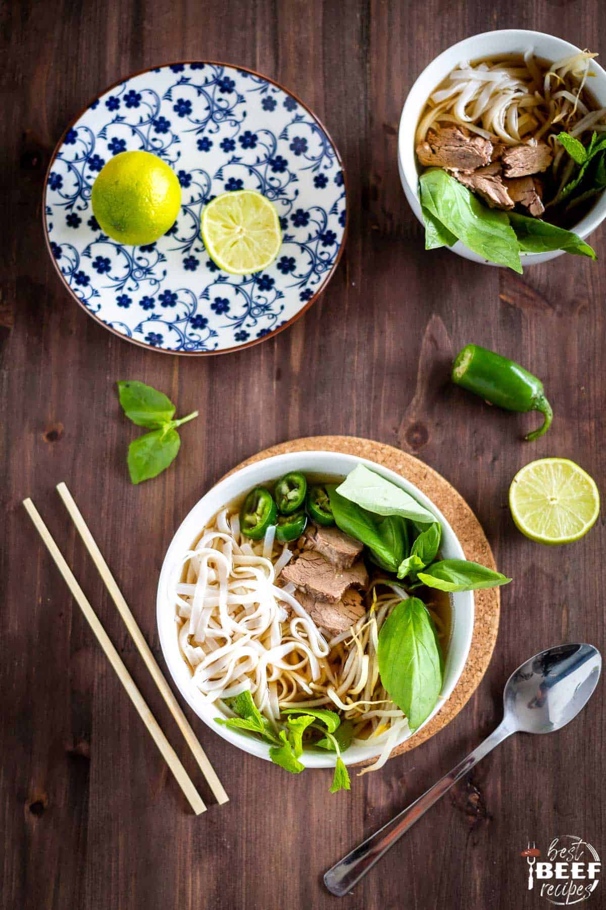 Top down view of two bowls of instant pot beef pho