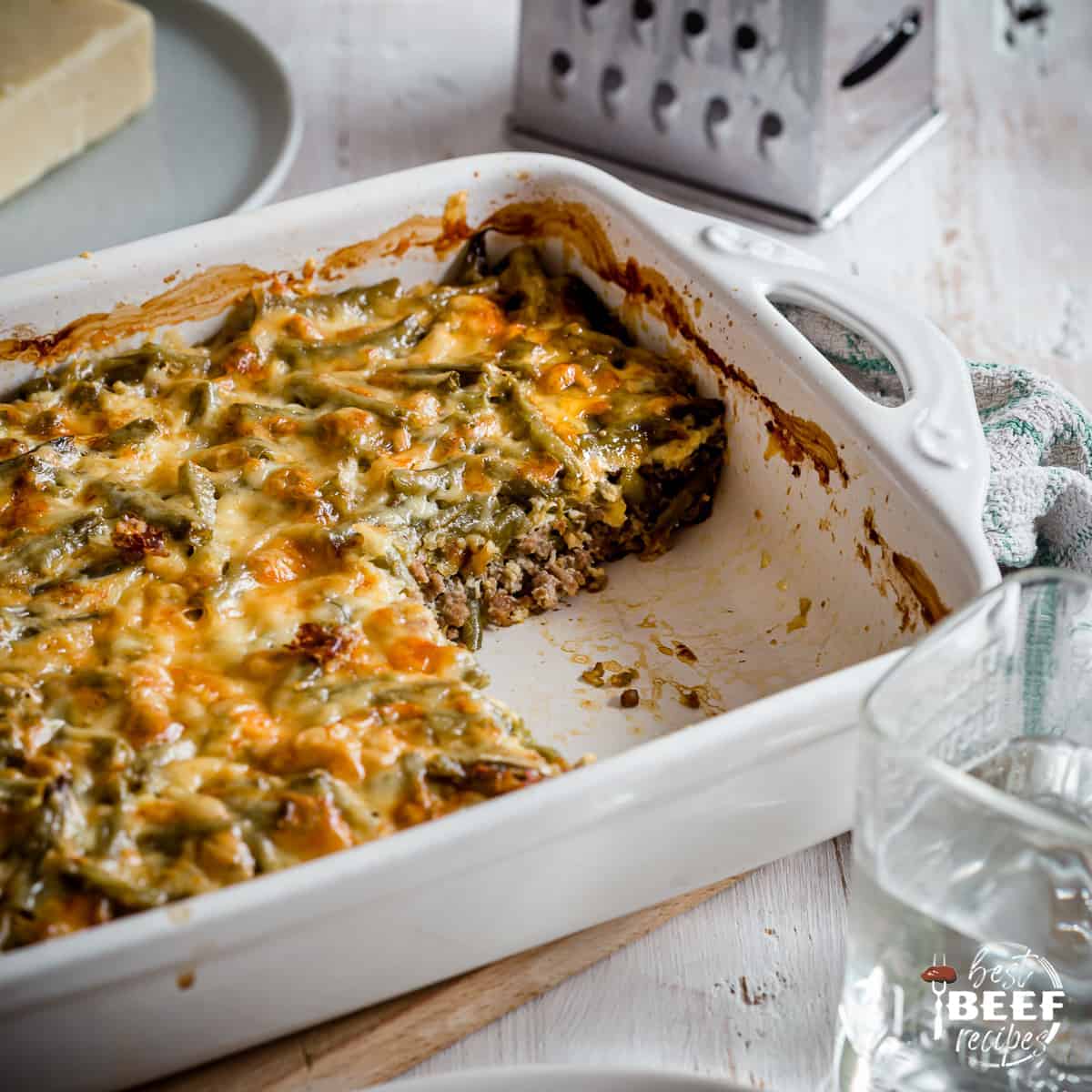 Keto Hamburger Casserole with green beans in a baking dish 