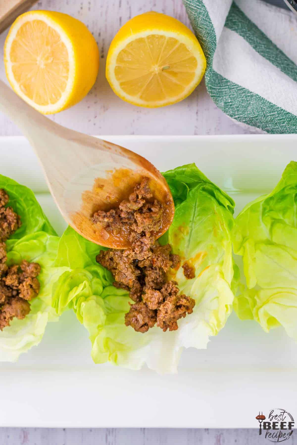 Portioning beef into lettuce wraps recipe