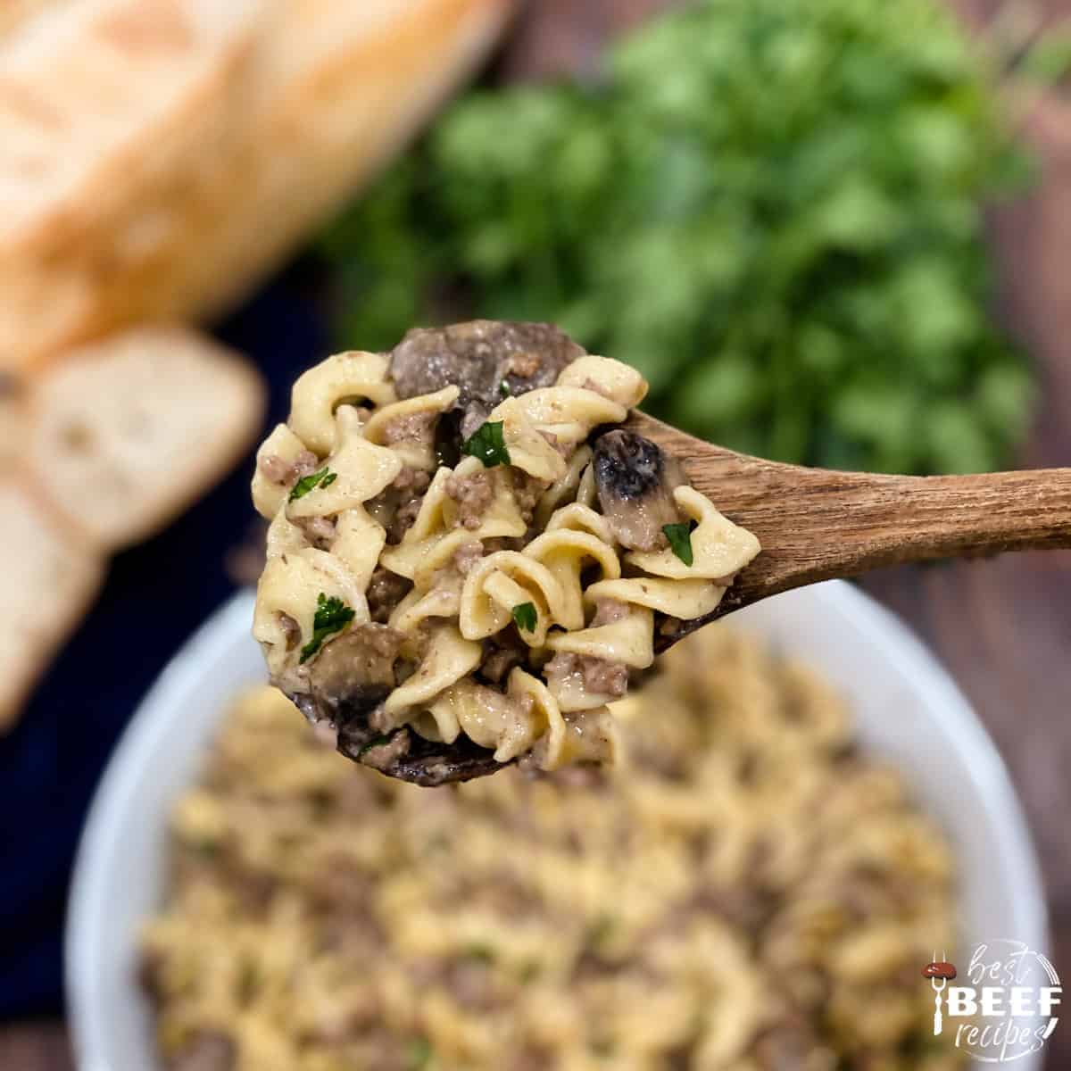 Close up of a spoonful of instant pot ground beef stroganoff