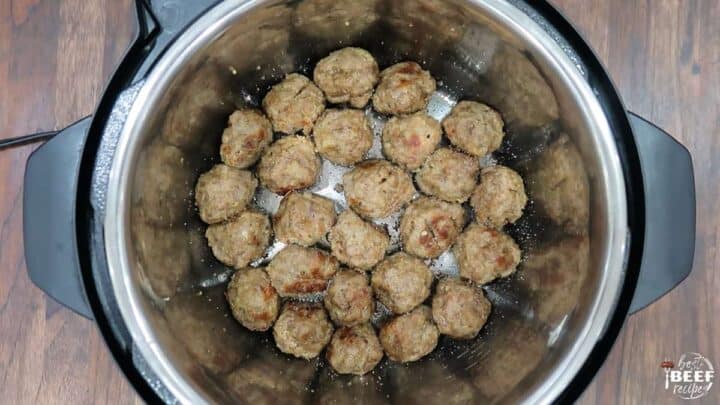 Cooked meatballs browning in the instant pot