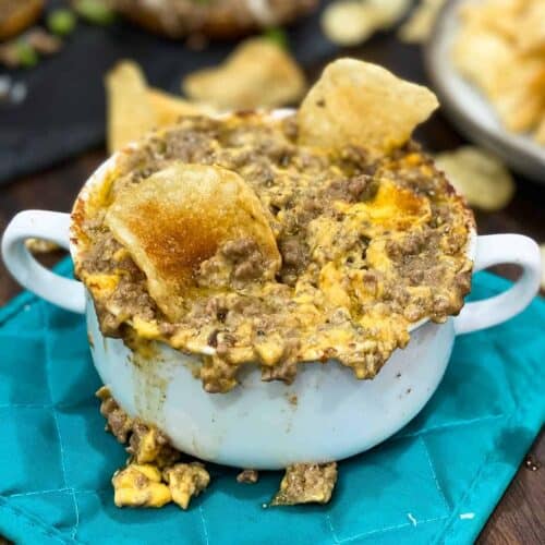 Instant Pot Philly cheese steak dip in a white bowl with handles