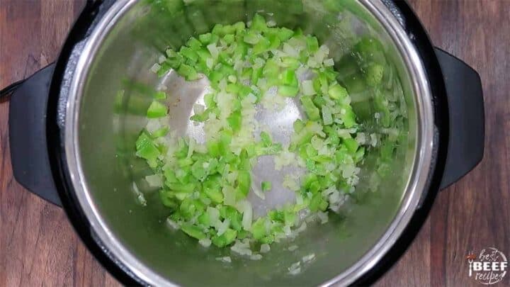 Cooking green peppers, onions, and garlic in the instant pot