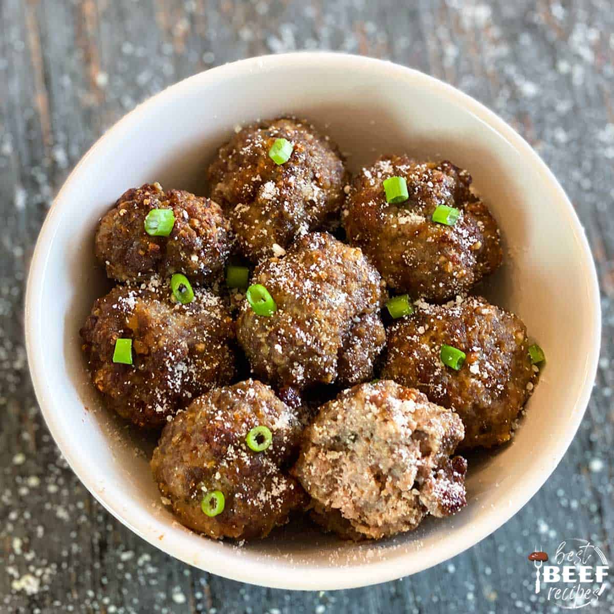 Air fryer meatballs piled in a white bowl