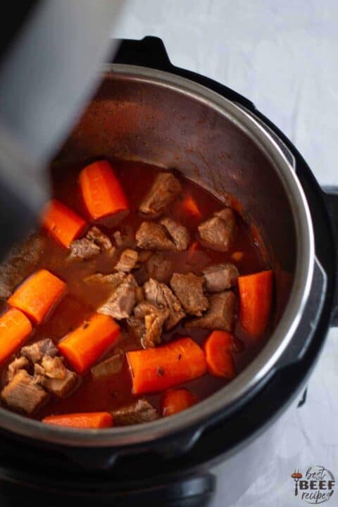 Adding carrots to instant pot and cooking on high pressure