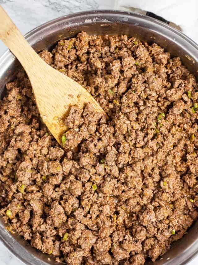 Ground beef cooking in skillet