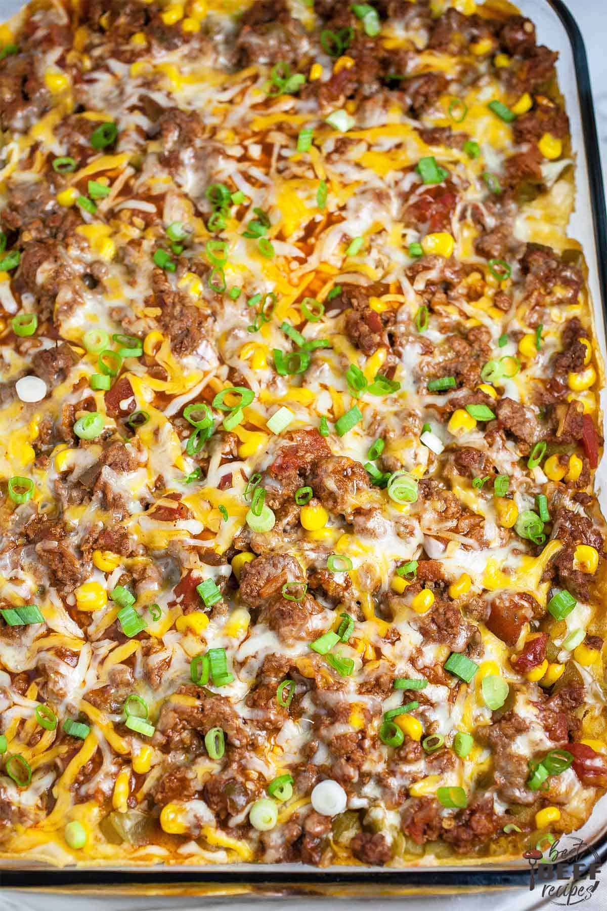 Taco casserole in a glass dish up close