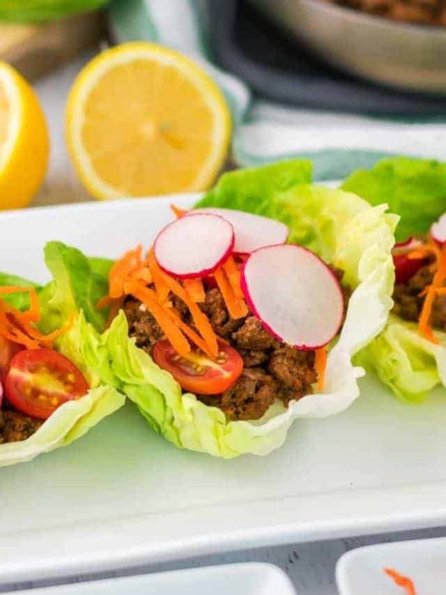Portuguese beef lettuce wraps on a white platter