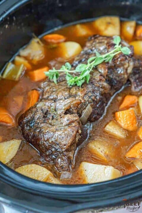 slow cooker pot roast with red wine in crockpot