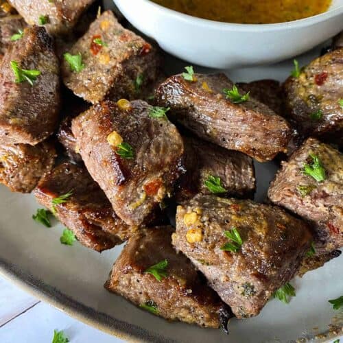 Close up of air fryer steak bites on plate