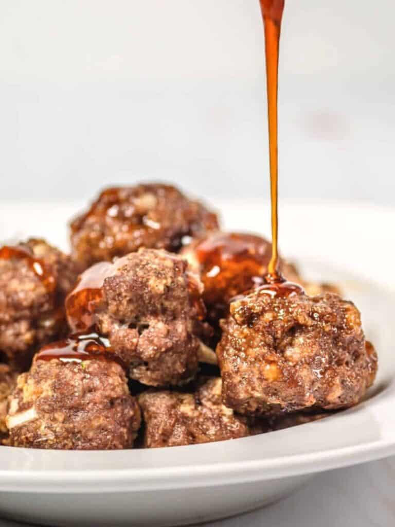 Honey Sriracha Meatballs on a white plate.