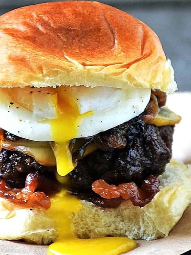 Juicy Poached Egg Burger with Caramelized Onions