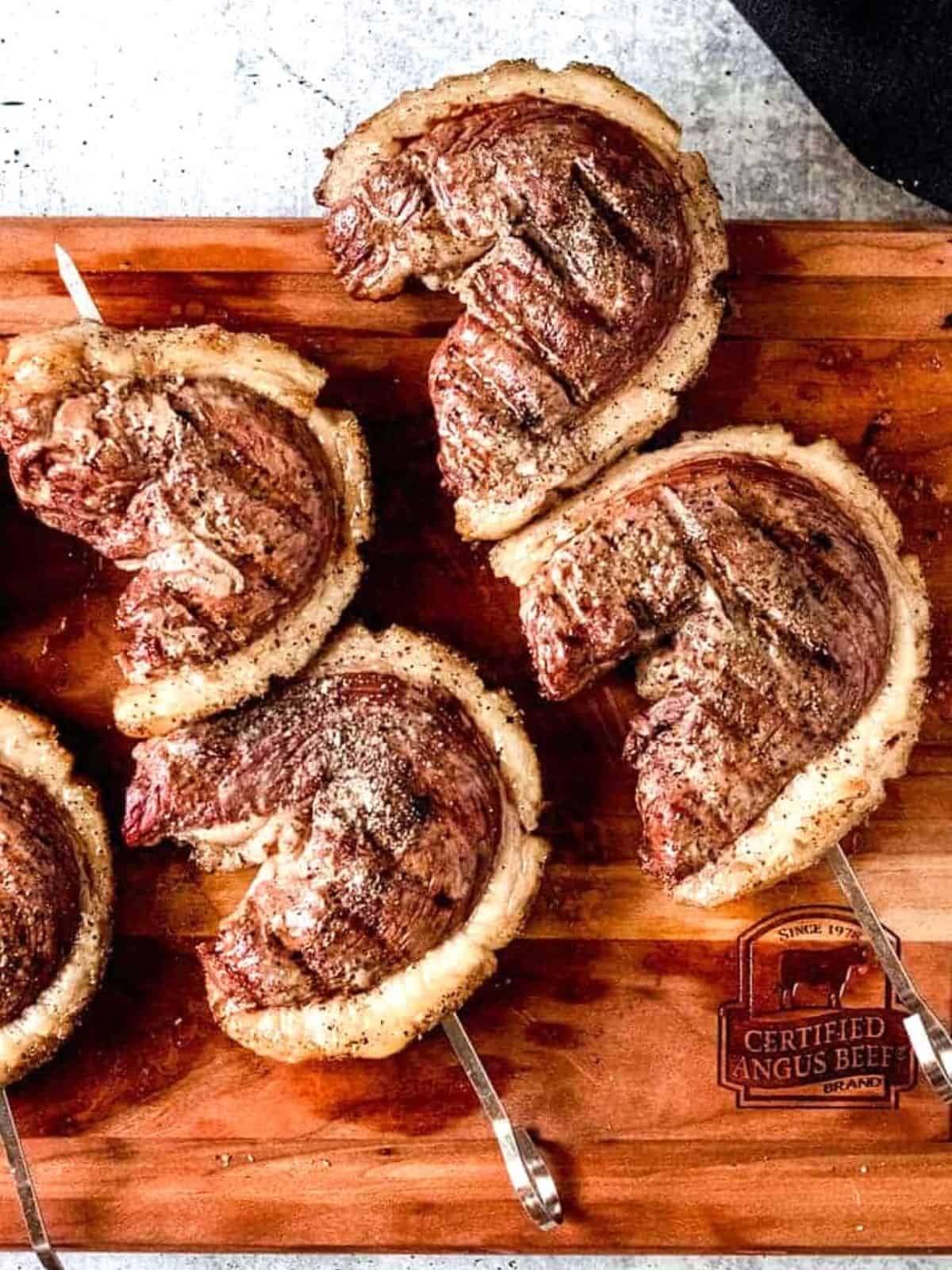 picanha steak skewers on a cutting board