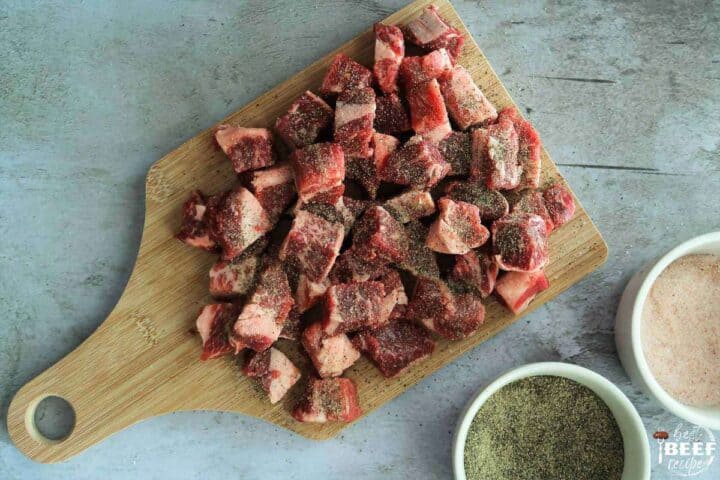 seasoned beef short ribs on a cutting board