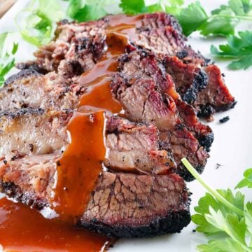 smoked brisket sliced with red gravy