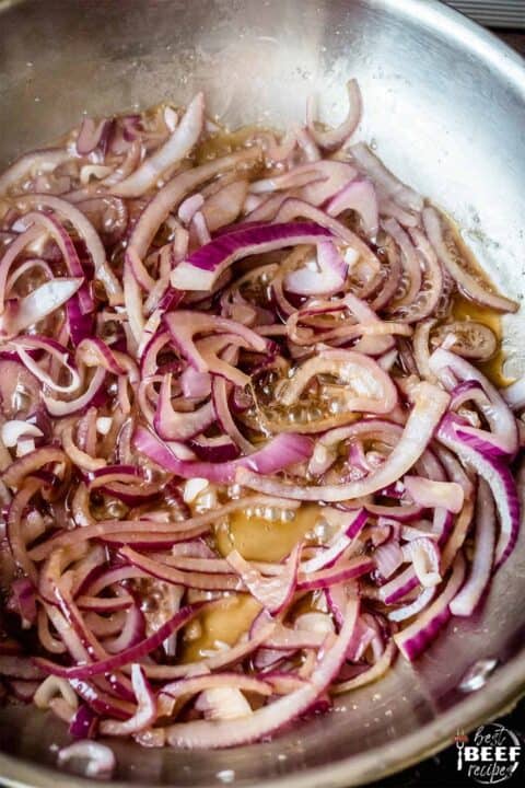 Caramelized onions cooking in a pan