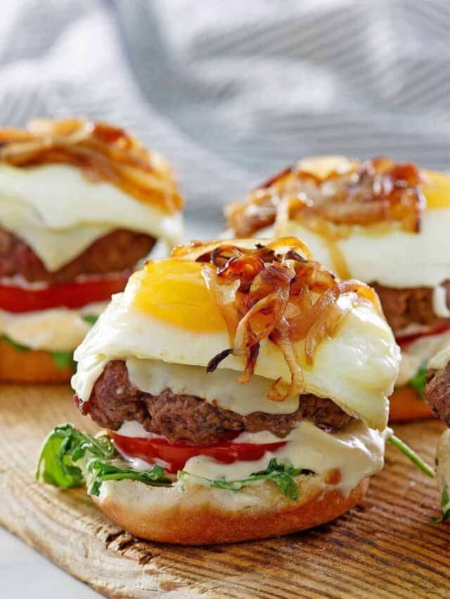 three open-face egg burgers