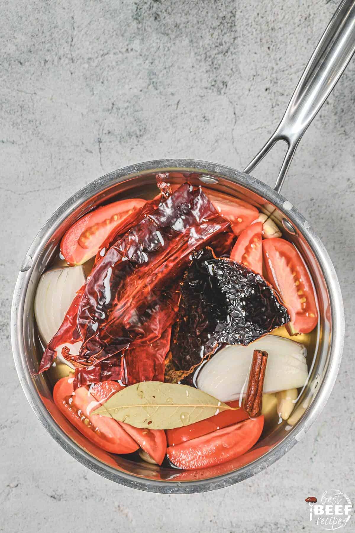 birria stew ingredients in pot