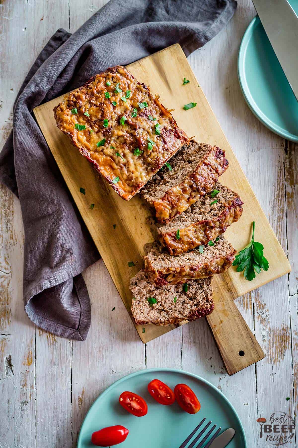 Keto meatloaf on a wooden serving board