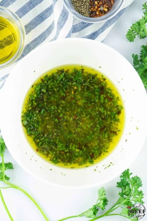 Mixed chimichurri sauce in a bowl