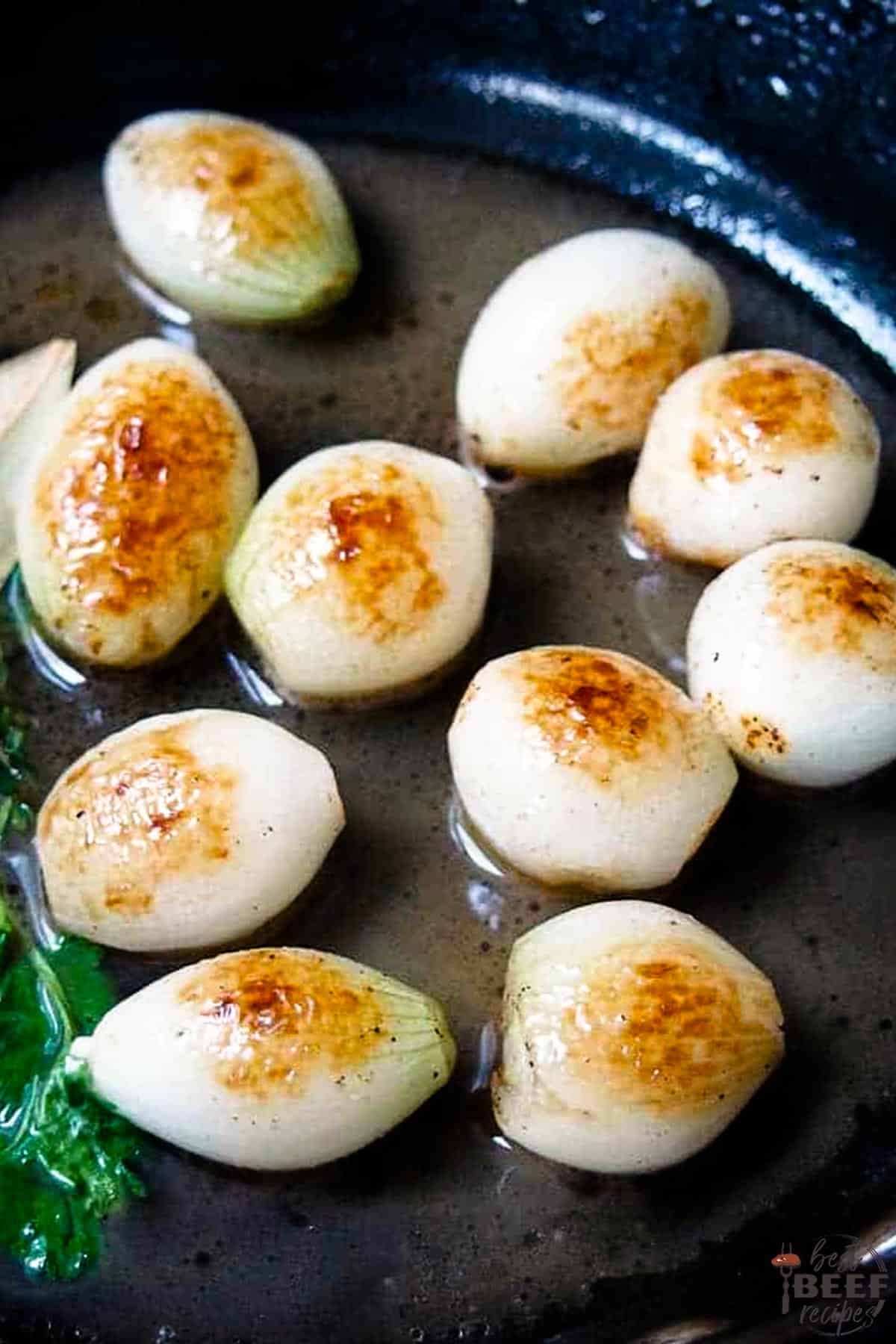 Pearl onions in a pan