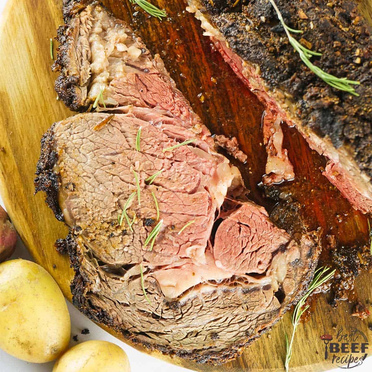 Sliced grilled prime rib on cutting board