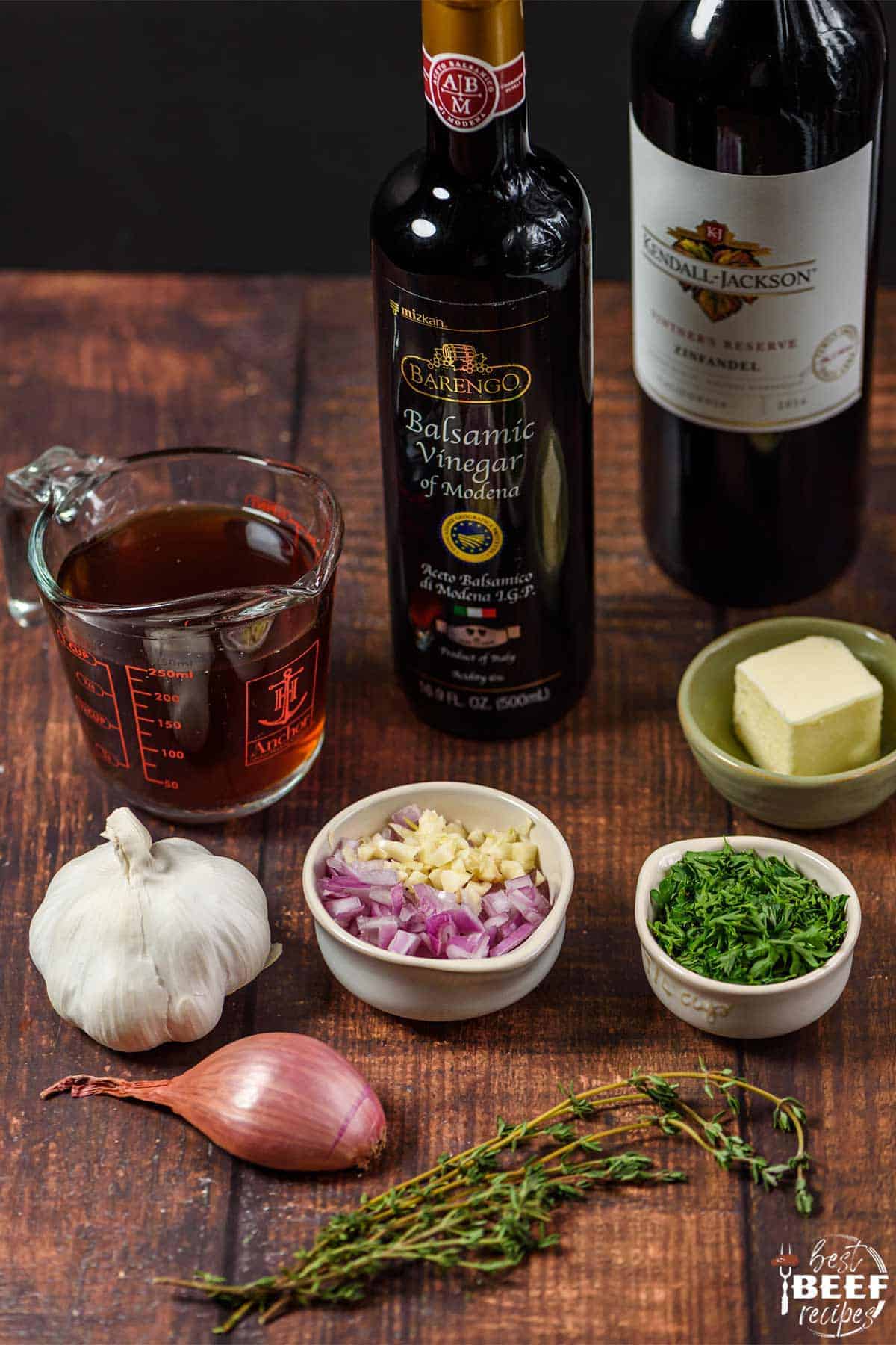 Ingredients to make red wine reduction on a table