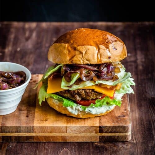 Grilled burger on a serving board