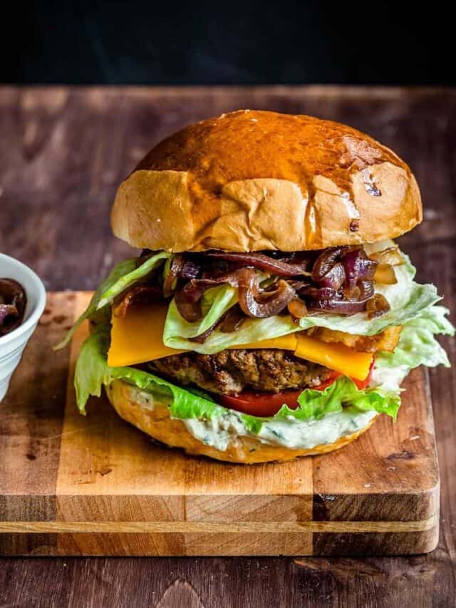 Grilled burger on a serving board