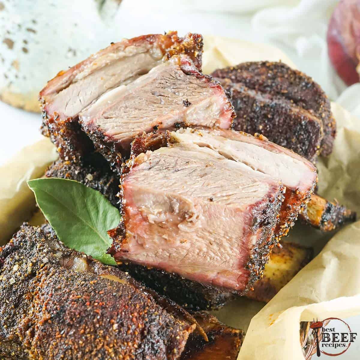 Smoked short ribs seasoned with dry rub for ribs in a basket