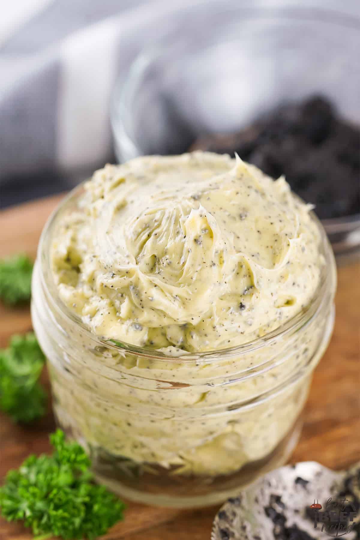 creamy truffle butter in a glass container