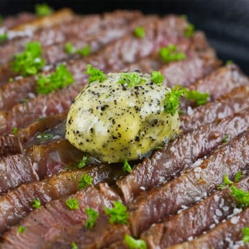 dollop of truffle butter on top of sliced wagyu steak