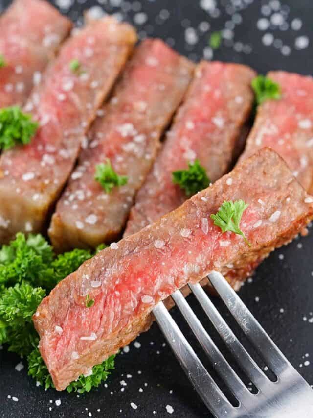 slices of wagyu steak with a fork
