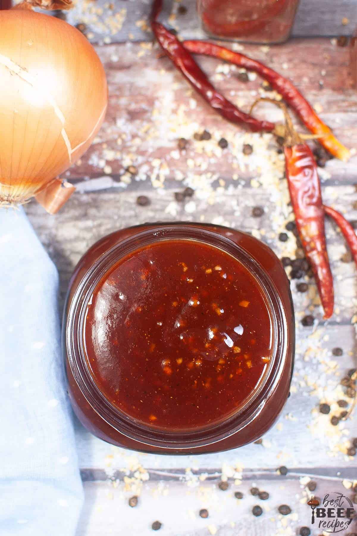 overhead photo of bbq sauce in a jar