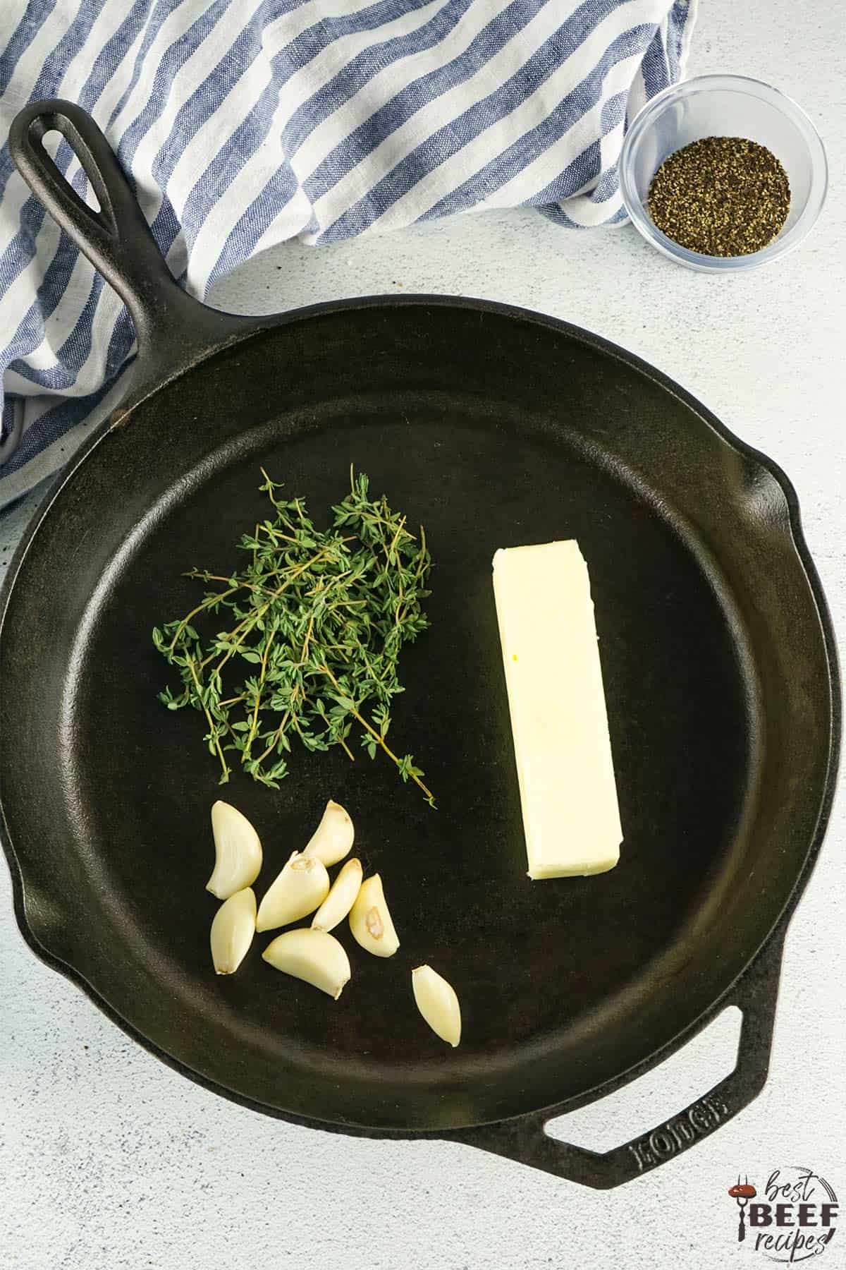 garlic butter ingredients in a cast iron skillet