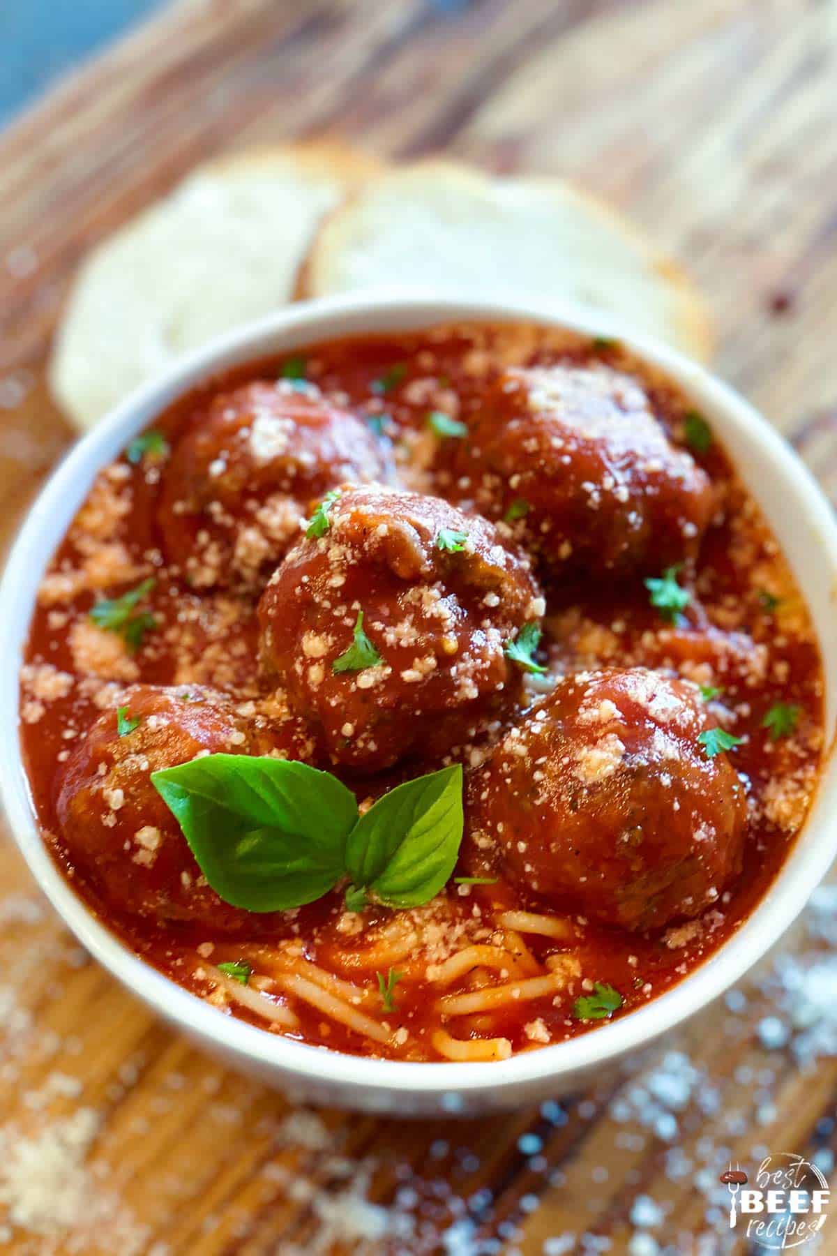 spaghetti sauce in a bowl with meatballs