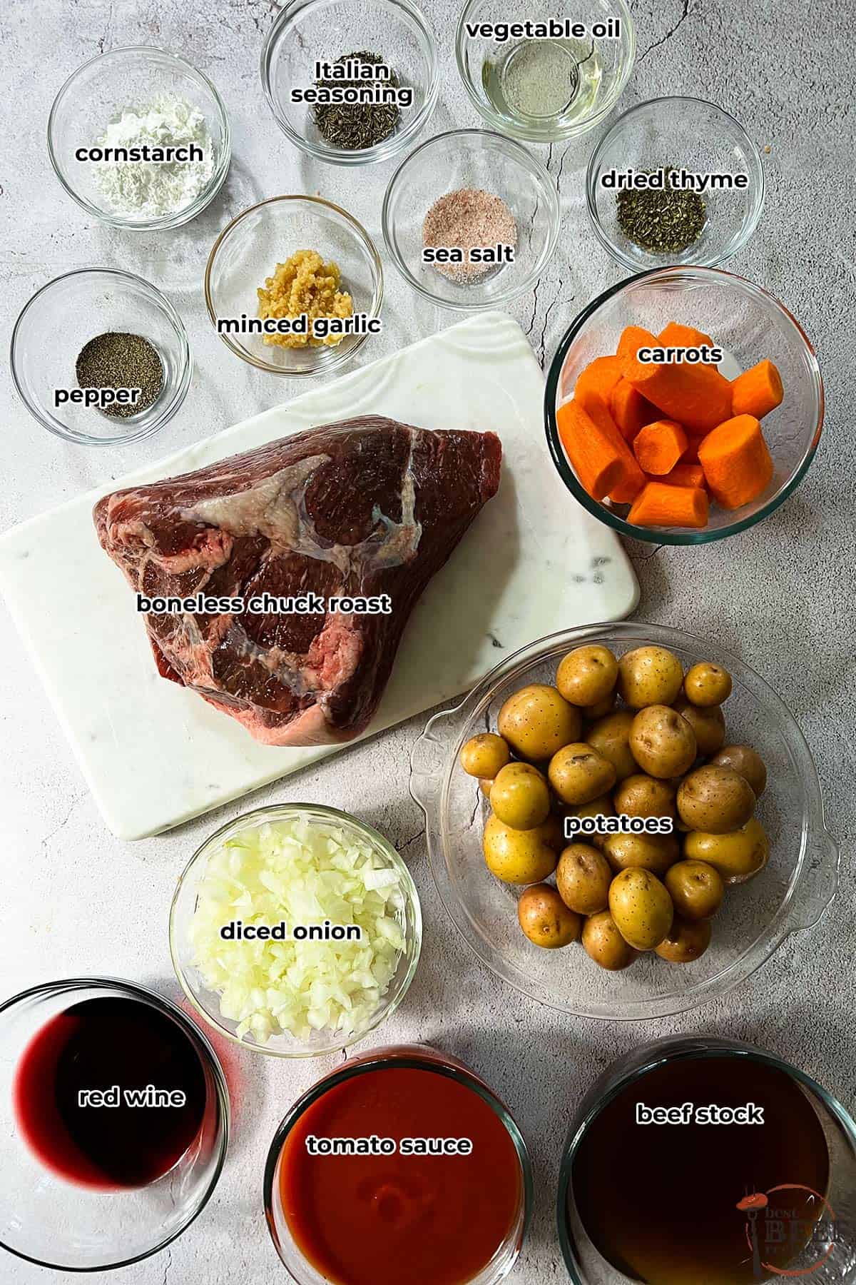 labeled ingredients to make instant pot pot roast in bowls on a white surface