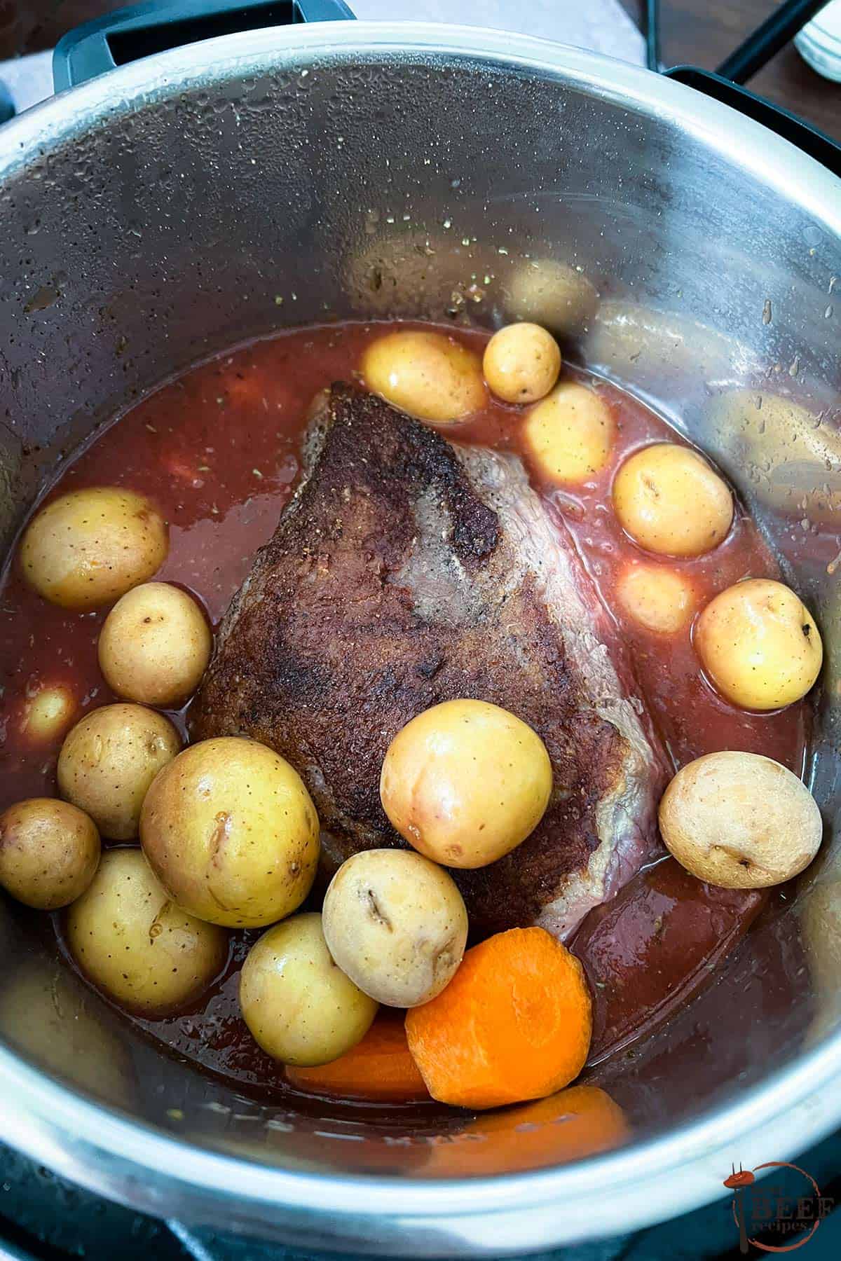 pot roast in the instant pot with potatoes and carrots