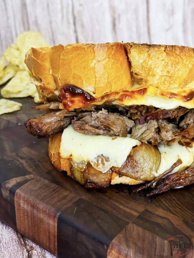 close up of pot roast sandwich with melty cheese and tender roast beef