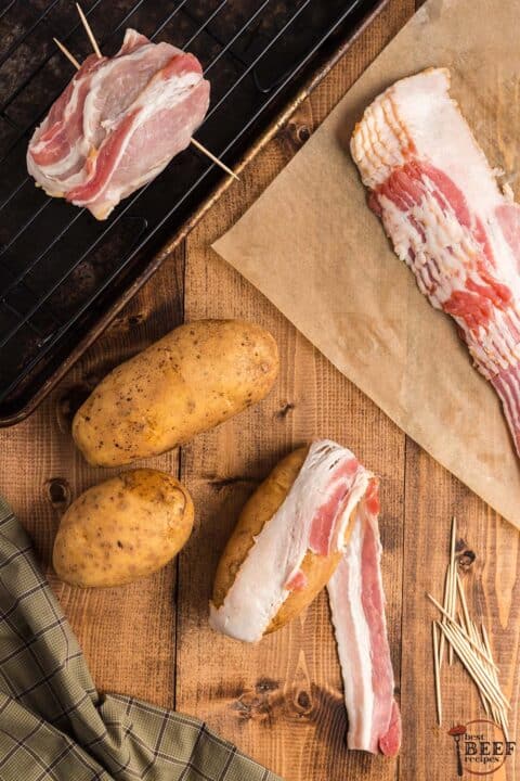 wrapping potatoes in bacon and securing it with toothpicks
