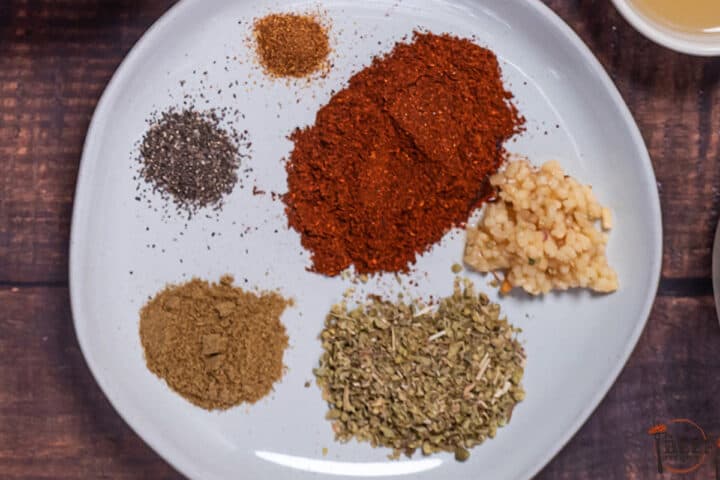 chili seasoning ingredients on a white plate