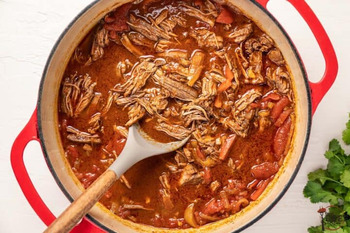 a large pot filled with completed cuban ropa vieja