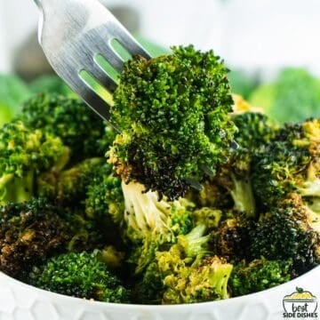 air fried broccoli in a bowl with a fork
