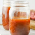 two mason jars of carolina bbq sauce