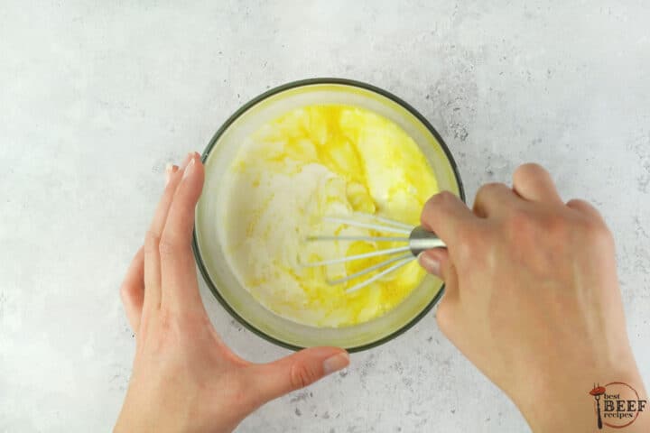 stirring eggs with heavy cream