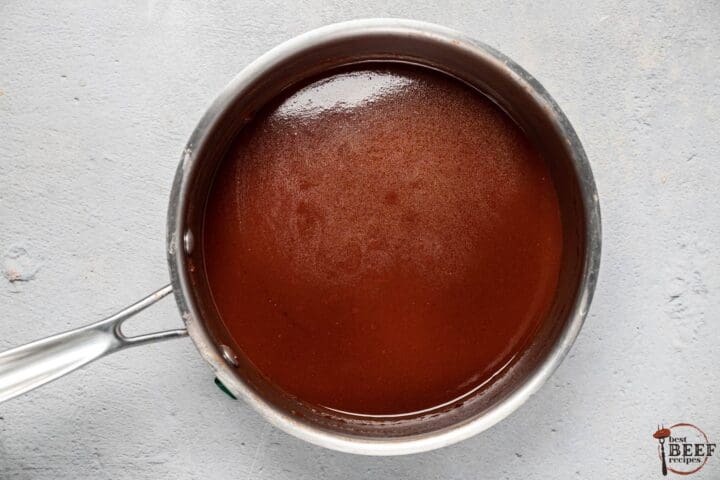 completed espagnole sauce in a pan after being strained