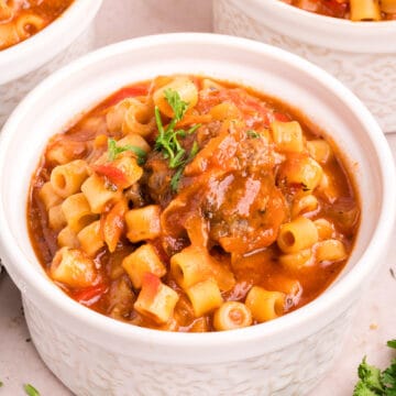 A close up of Italian meatball soup in a bowl