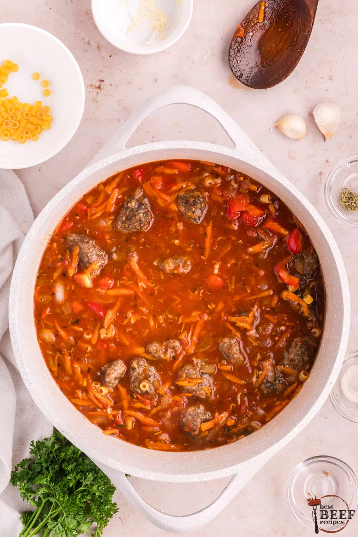 Italian meatball soup cooking in a pot